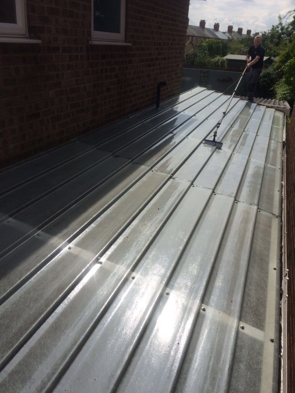 Clean roof tiles after professional moss removal treatment in Northamptonshire